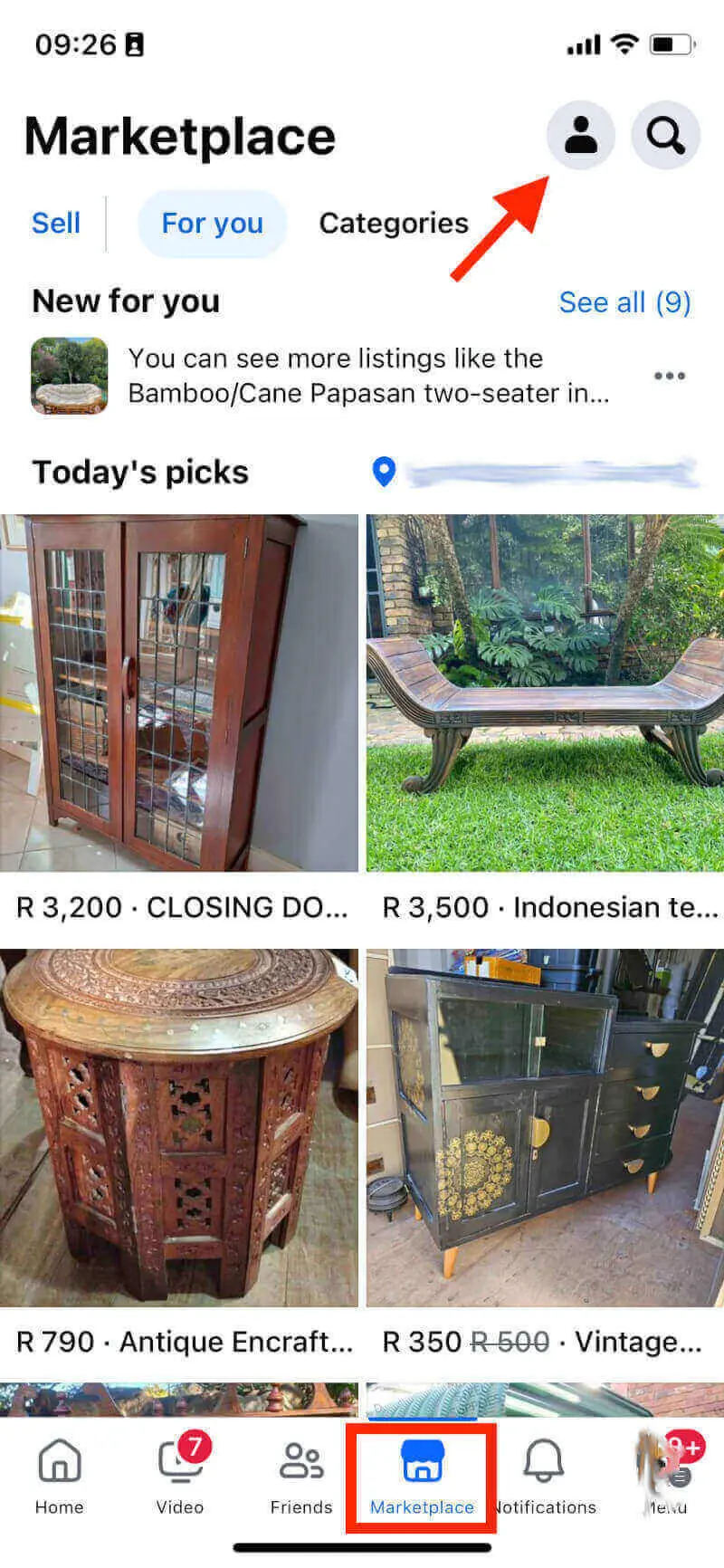 Marketplace tab in the Facebook mobile app, with an arrow pointing to the profile icon.