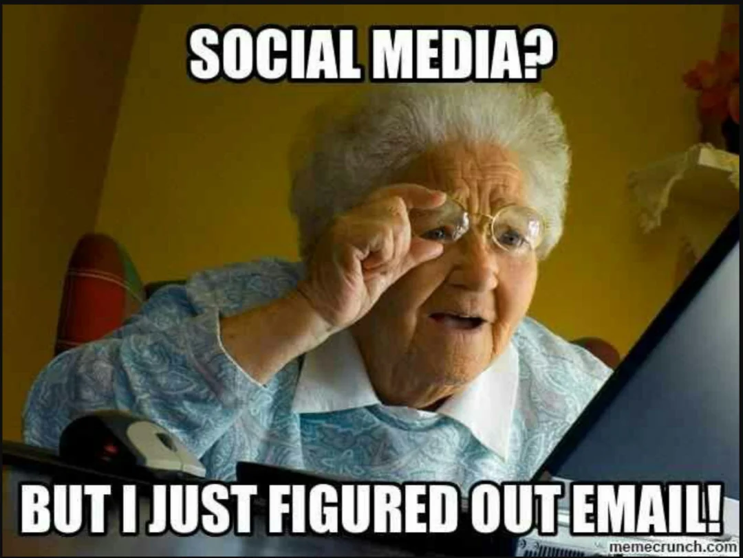 Meme of a grandmother peering at a laptop: 'Social media? But I just figured out email!'